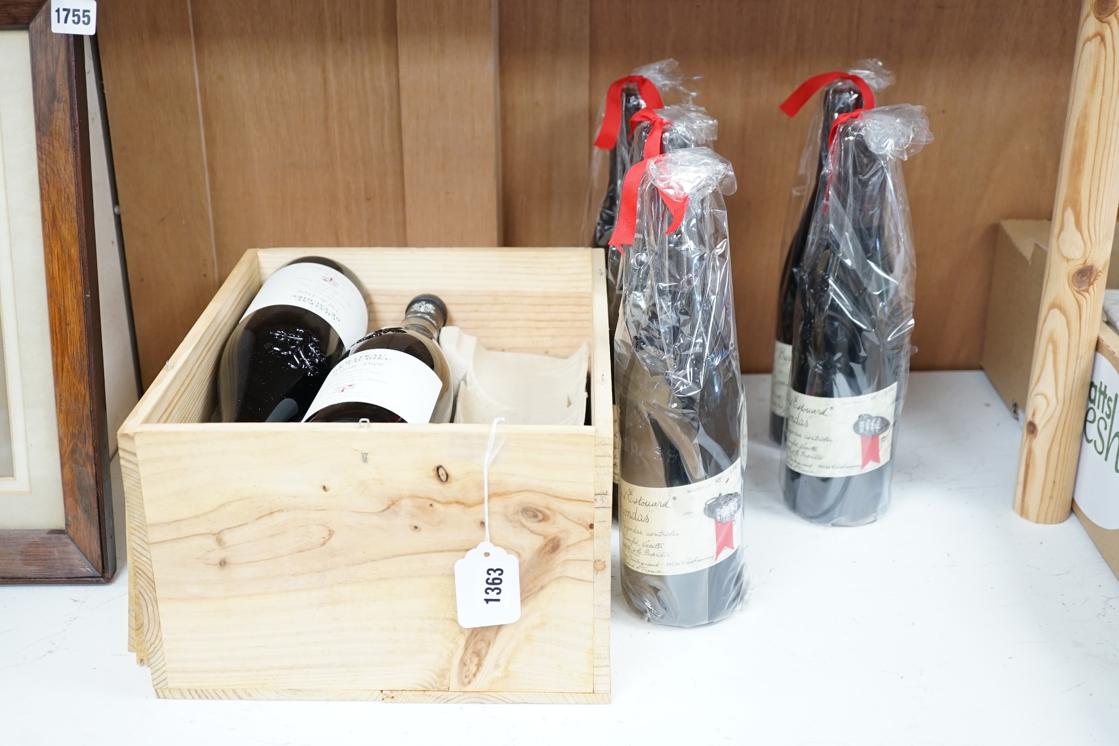 Twelve bottles of wine to include six bottles of Chateau de Vaudieu Val de Dieu 2006, and six bottles of Baronnie d’Estouard Gigondas 2006. Condition - good, storage history unknown.